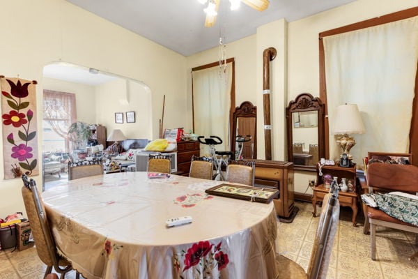 2016 W Superior St, Chicago, IL 60612 - dining room with arched walkways and ceiling fan