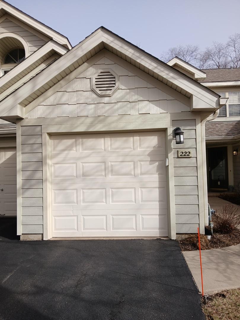 garage featuring driveway