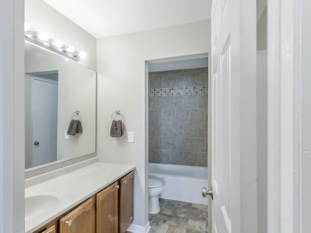 full bathroom with vanity, bathing tub / shower combination, and toilet