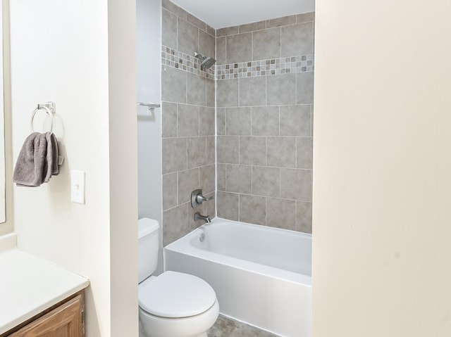 bathroom with vanity, toilet, and shower / bath combination