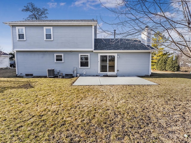 rear view of property featuring a patio, a lawn, central AC, and roof with shingles