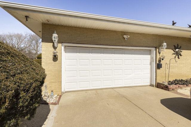 garage featuring driveway