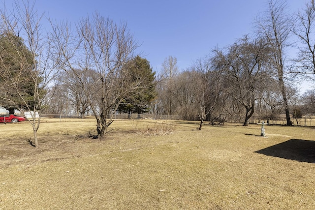 view of yard with fence