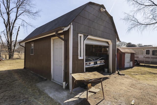 view of outbuilding with an outbuilding
