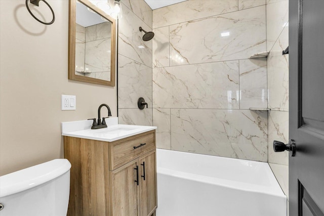 bathroom with toilet, shower / washtub combination, and vanity