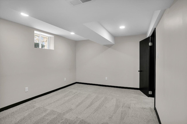 below grade area with carpet, recessed lighting, baseboards, and visible vents