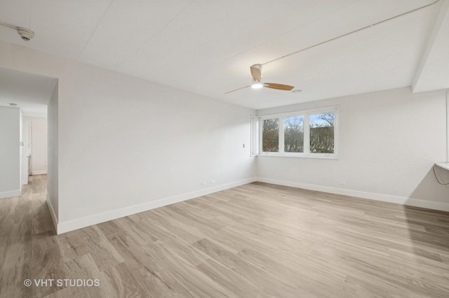 7202 Oak Ave Unit 1Ne, River Forest, IL 60305 - empty room featuring light wood-type flooring, baseboards, a ceiling fan, and a smoke detector