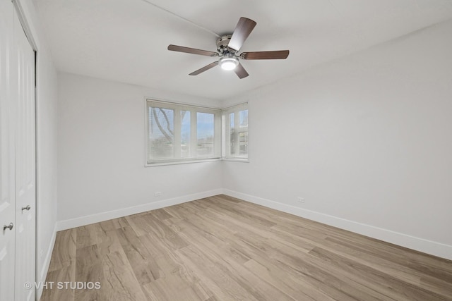7202 Oak Ave Unit 1Ne, River Forest, IL 60305 - spare room with light wood-style floors, baseboards, and a ceiling fan