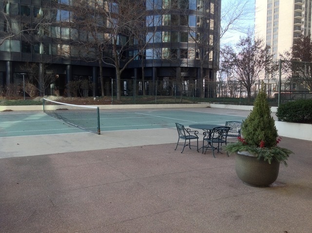 195 N Harbor Dr Unit 207, Chicago, IL 60601 - view of swimming pool featuring a tennis court and fence