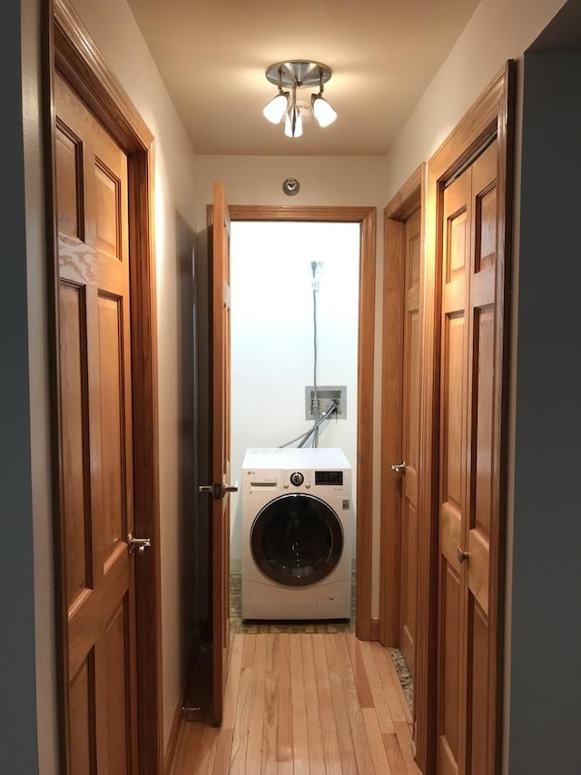 195 N Harbor Dr Unit 207, Chicago, IL 60601 - laundry room with washer / clothes dryer, light wood-type flooring, and laundry area