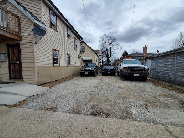view of property exterior with driveway