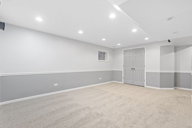 finished basement with recessed lighting, baseboards, and carpet floors