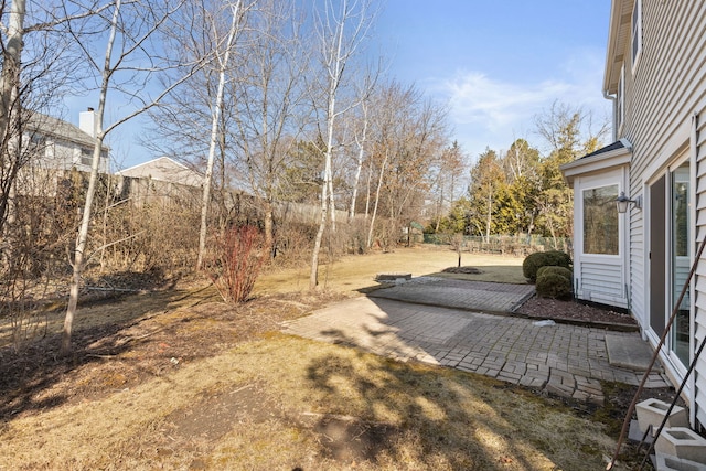 view of yard with a patio and fence