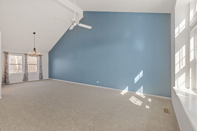 carpeted spare room with beamed ceiling, ceiling fan with notable chandelier, baseboards, and high vaulted ceiling