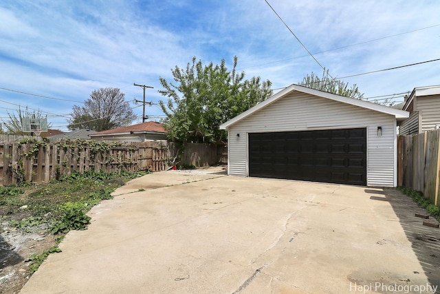 detached garage with fence