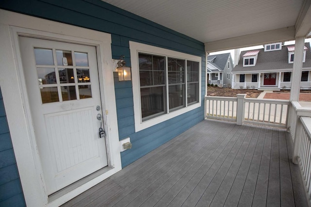 wooden terrace with covered porch