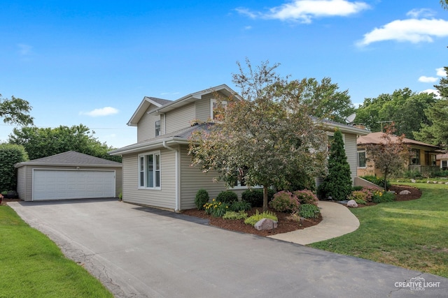 432 S Cherry St, Itasca, IL 60143 - view of front of house featuring a detached garage, a front yard, and an outbuilding