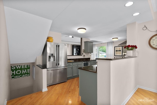 432 S Cherry St, Itasca, IL 60143 - kitchen with stainless steel fridge with ice dispenser, dark countertops, light wood finished floors, a peninsula, and gray cabinets