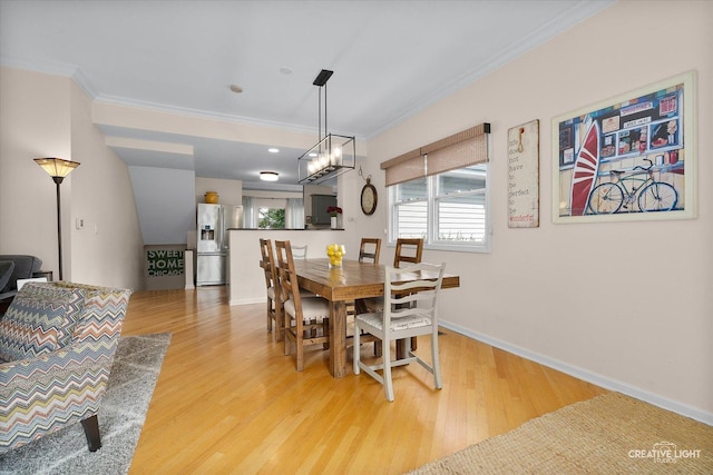 432 S Cherry St, Itasca, IL 60143 - dining space featuring ornamental molding and light wood-style floors
