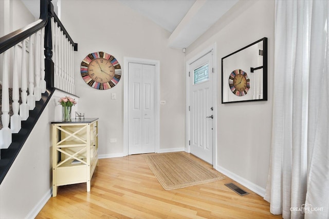 432 S Cherry St, Itasca, IL 60143 - entryway with light wood-style floors, stairway, and vaulted ceiling