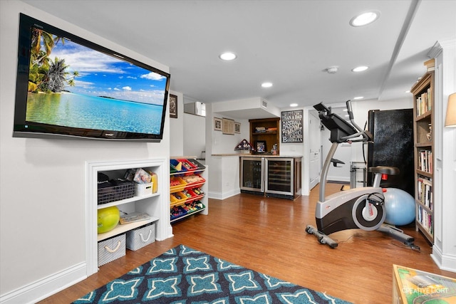 432 S Cherry St, Itasca, IL 60143 - exercise area featuring beverage cooler, a bar, wood finished floors, and recessed lighting