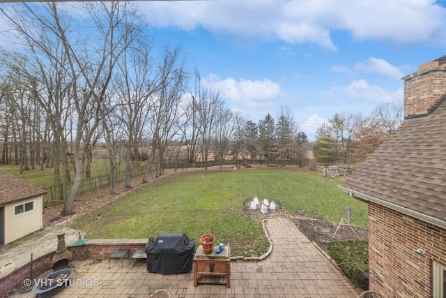 view of yard featuring a fenced backyard and a patio