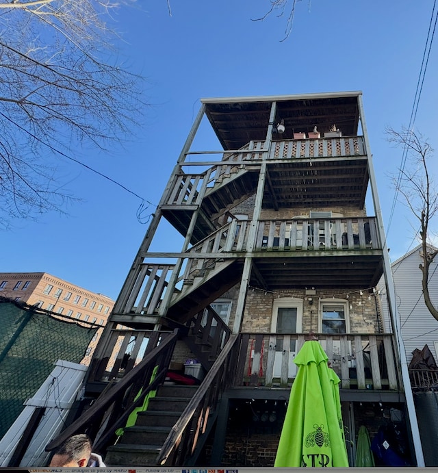 944 W 18th St, Chicago, IL 60608 - rear view of property with stairs, a balcony, and brick siding