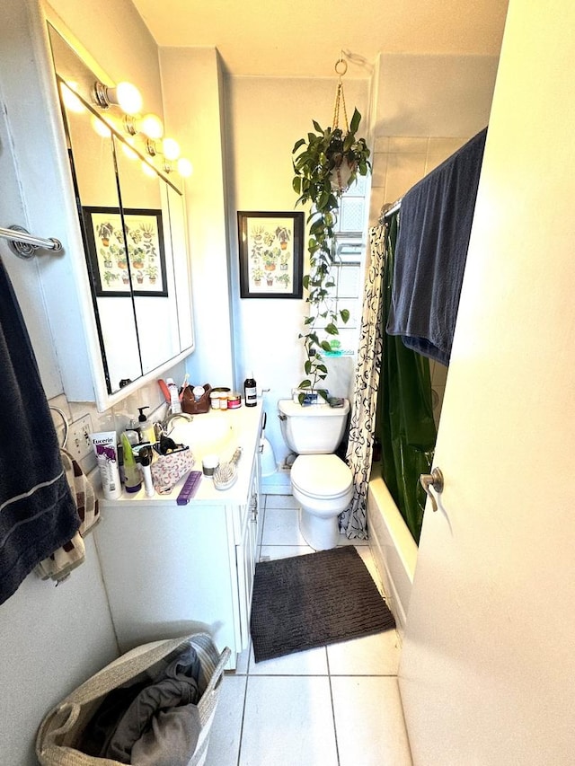 944 W 18th St, Chicago, IL 60608 - bathroom featuring tile patterned flooring, toilet, vanity, and shower / bath combo with shower curtain