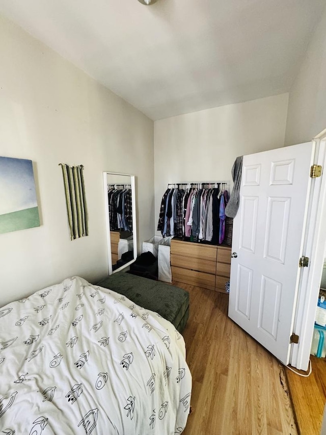 944 W 18th St, Chicago, IL 60608 - bedroom with light wood-type flooring