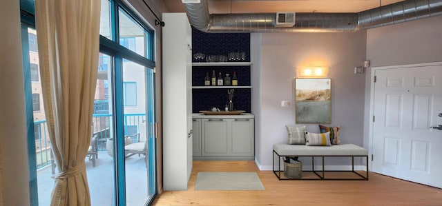 910 W Madison St Unit 501, Chicago, IL 60607 - bar area with wood finished floors and a sink