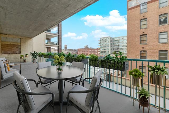 910 W Madison St Unit 501, Chicago, IL 60607 - balcony with a view of city and outdoor dining area