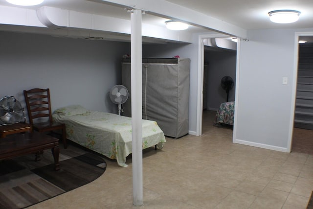 bedroom featuring baseboards