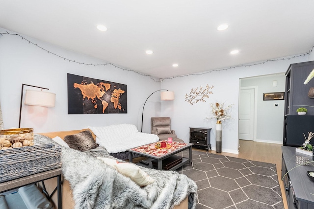 living area with recessed lighting and dark wood-style flooring