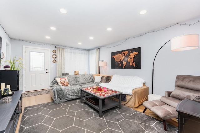 living room featuring recessed lighting and dark wood-type flooring