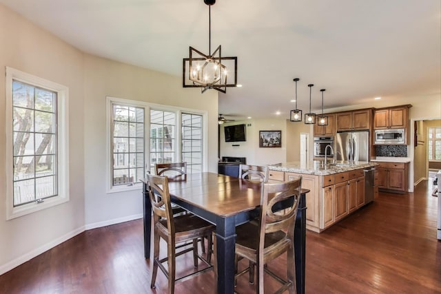 1056 W Willow St, Palatine, IL 60067 - dining room featuring ceiling fan with notable chandelier, baseboards, recessed lighting, and dark wood-style floors