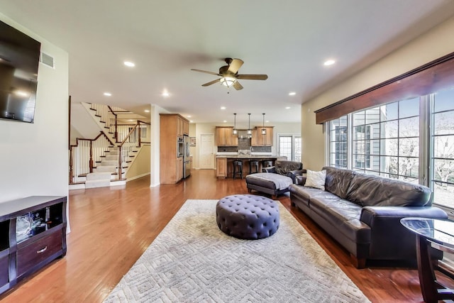 1056 W Willow St, Palatine, IL 60067 - living room featuring recessed lighting, stairway, wood finished floors, and ceiling fan