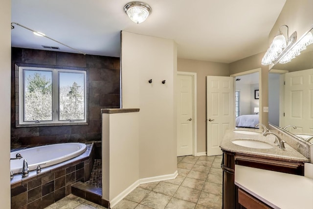1056 W Willow St, Palatine, IL 60067 - full bathroom featuring a bath, visible vents, tile patterned floors, double vanity, and baseboards