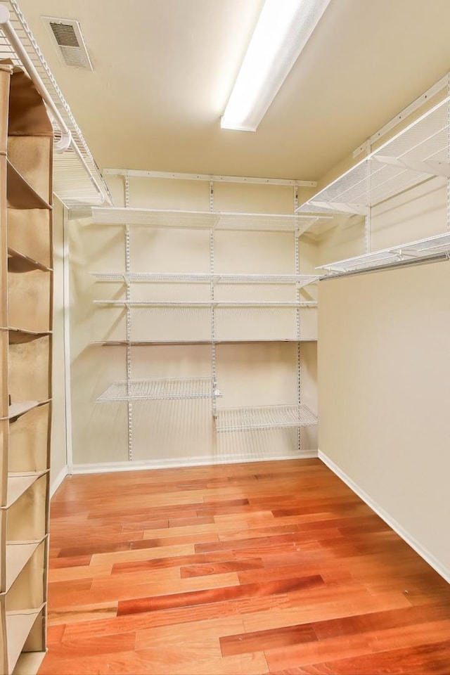 1056 W Willow St, Palatine, IL 60067 - walk in closet with wood finished floors and visible vents