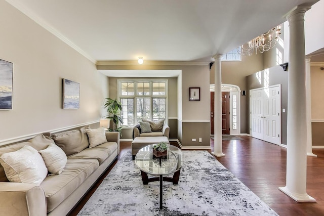 1056 W Willow St, Palatine, IL 60067 - living room featuring dark wood-style flooring, baseboards, decorative columns, and crown molding