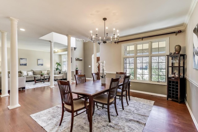 1056 W Willow St, Palatine, IL 60067 - dining area with crown molding, wood finished floors, decorative columns, and a wealth of natural light