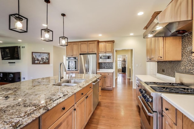 1056 W Willow St, Palatine, IL 60067 - kitchen with light wood-type flooring, backsplash, extractor fan, stainless steel appliances, and a sink