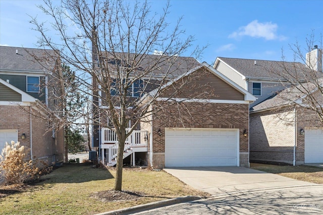 6005 River Bend Dr, Lisle, IL 60532 - traditional home featuring driveway, a front yard, an attached garage, brick siding, and central AC unit