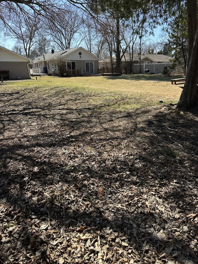 view of yard featuring fence