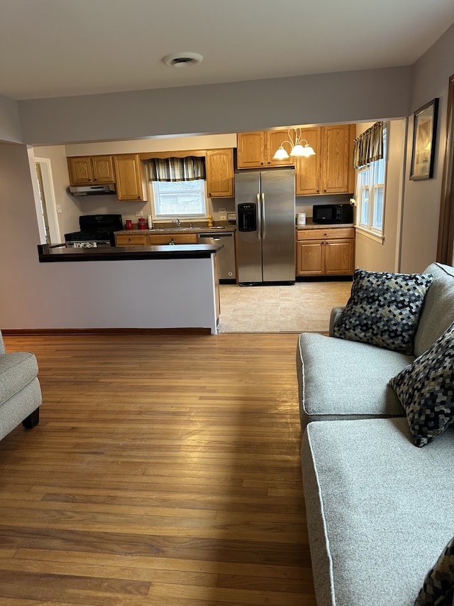 6724 W 114th St, Worth, IL 60482 - living area featuring light wood-style flooring and baseboards