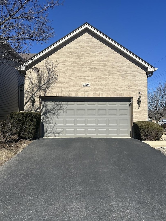 garage with driveway