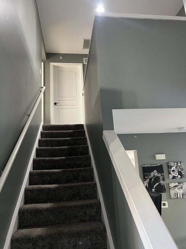 staircase with visible vents