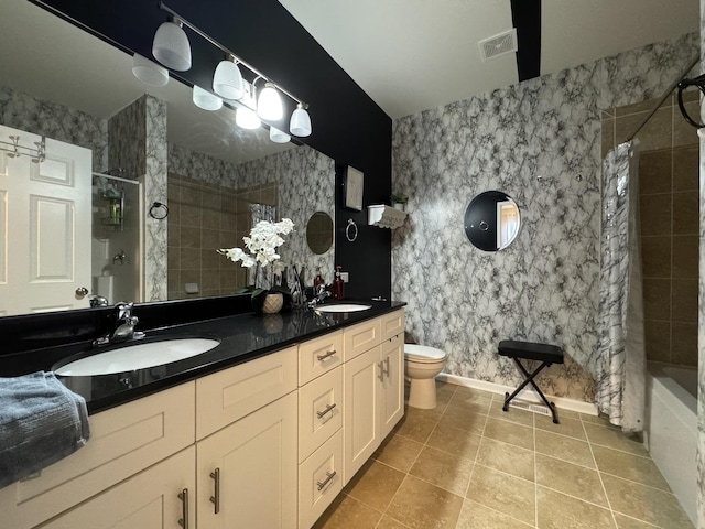 997 Regent Dr, Matteson, IL 60443 - bathroom with tile patterned floors, toilet, double vanity, and baseboards