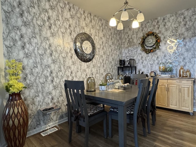 997 Regent Dr, Matteson, IL 60443 - dining space with wallpapered walls, dark wood-style flooring, and baseboards
