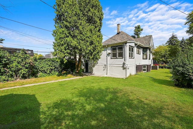 view of yard featuring central AC