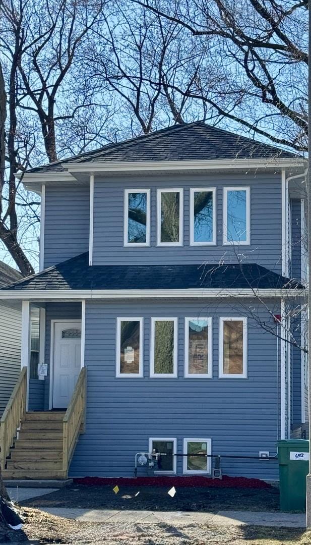 1131 S Ridgeland Ave, Oak Park, IL 60304 - view of front of property featuring entry steps and a shingled roof